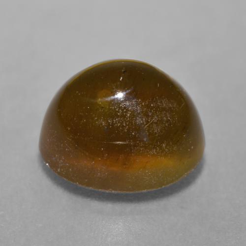 7.22カラットの天然ディープオレンジブラウンCat's Eye Apatite（11.4×9.4 mm・オーバルカット）