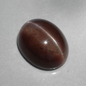 5.30カラットの天然ダークブラウンCat's Eye Scapolite（12.1×9.6 mm・オーバルカット）