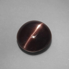 3.46カラットの天然ダークブラウンCat's Eye Scapolite（9.4×8.9 mm・オーバルカット）