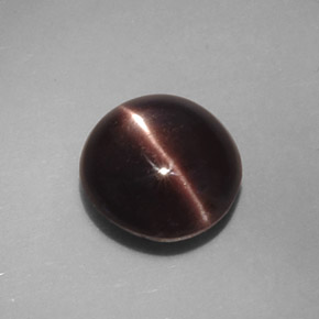 3.46カラットの天然ダークブラウンCat's Eye Scapolite（9.4×8.9 mm・オーバルカット）