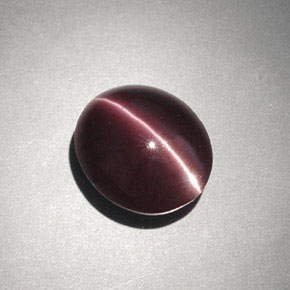 4.00カラットの天然ダークブラウンCat's Eye Scapolite（10.6×9.1 mm・オーバルカット）