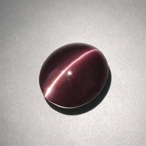 4.00カラットの天然ダークブラウンCat's Eye Scapolite（10.6×9.1 mm・オーバルカット）