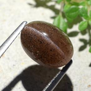 4.55カラットの天然ディープオレンジブラウンCat's Eye Scapolite（10.7×7.9 mm・オーバルカット）