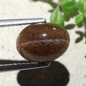4.55カラットの天然ディープオレンジブラウンCat's Eye Scapolite（10.7×7.9 mm・オーバルカット）