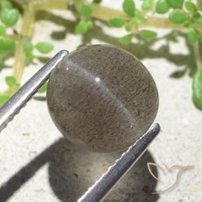 3.94カラットの天然ミディアム薄いブラウンCat's Eye Scapolite（9.6×9.2 mm・オーバルカット）