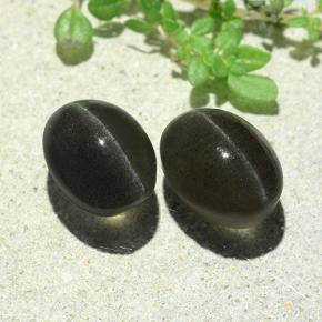 7.38カラットの天然ダークグレーCat's Eye Scapolite（9.9×7.5 mm・オーバルカット）