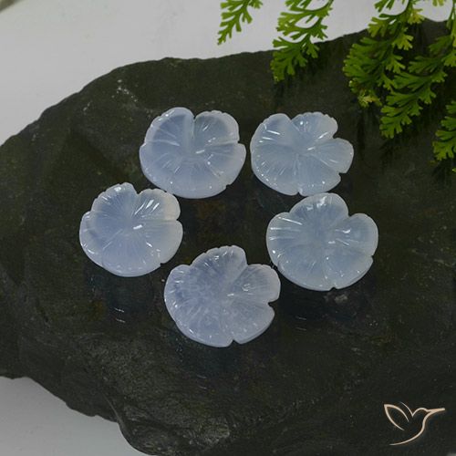 Shop natural 26.27ct 薄いパープルがかったブルー カルセドニー gems, フラワーカット, from ブラジル at GemSelect. In stock, global shipping!