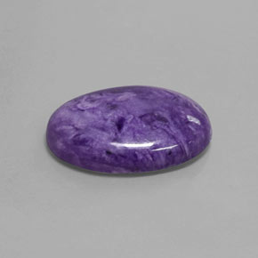14.42カラットの天然バイオレットチャロアイト（22.1×16 mm・オーバルカット）