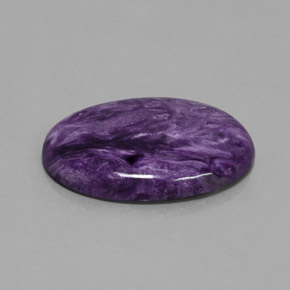 27.90カラットの天然バイオレットチャロアイト（30.2×22 mm・オーバルカット）