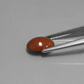 1.04カラットの天然マルチカラーチョコレートオパール（9.1×7.1 mm・オーバルカット）