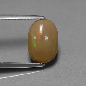 2.59カラットの天然マルチカラーチョコレートオパール（12.7×8.6 mm・オーバルカット）
