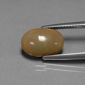 2.59カラットの天然マルチカラーチョコレートオパール（12.7×8.6 mm・オーバルカット）
