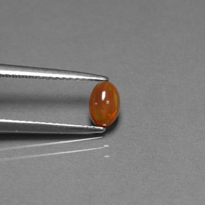 0.40カラットの天然マルチカラーチョコレートオパール（6×4.1 mm・透明）