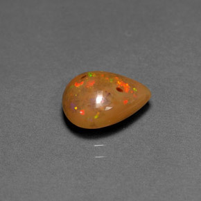 1.64カラットの天然マルチカラーチョコレートオパール（10.5×8.5 mm・洋梨の形）