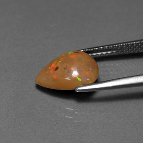 1.64カラットの天然マルチカラーチョコレートオパール（10.5×8.5 mm・洋梨の形）
