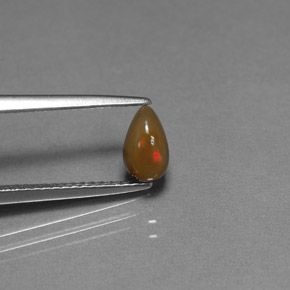 0.46カラットの天然マルチカラーチョコレートオパール（7×4.2 mm・洋梨の形）