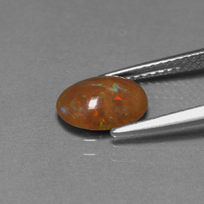 0.83カラットの天然マルチカラーチョコレートオパール（9.1×6.9 mm・オーバルカット）