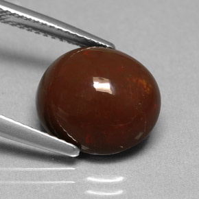 5.05カラットの天然マルチカラーチョコレートオパール、オーバルカット、オペーク