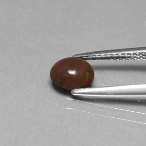 0.49カラットの天然マルチカラーチョコレートオパール、オーバルカット、オペーク