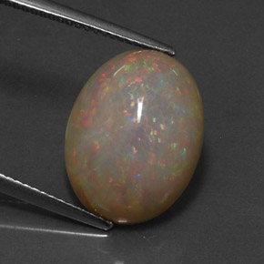 5.59カラットの天然マルチカラーチョコレートオパール（16.5×12.6 mm・オーバルカット）