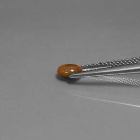 0.34カラットの天然マルチカラーチョコレートオパール、オーバルカット、オペーク