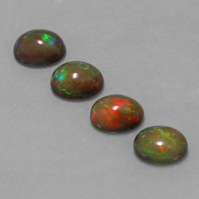 カラットの天然マルチカラーチョコレートオパール（8.1×6.1 mm・オーバルカット）
