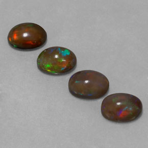 カラットの天然マルチカラーチョコレートオパール（8.1×6.1 mm・オーバルカット）