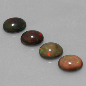カラットの天然マルチカラーチョコレートオパール（8×6.1 mm・オーバルカット）