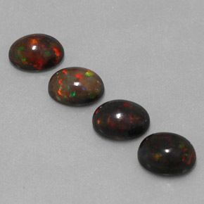 カラットの天然マルチカラーチョコレートオパール（8×6.1 mm・オーバルカット）