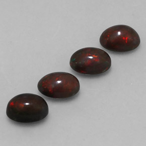 カラットの天然マルチカラーチョコレートオパール（7.1×5.1 mm・オーバルカット）