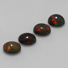 カラットの天然マルチカラーチョコレートオパール（7.1×5.1 mm・オーバルカット）