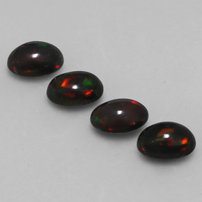 カラットの天然マルチカラーチョコレートオパール（7.1×5.1 mm・オーバルカット）
