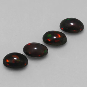 カラットの天然マルチカラーチョコレートオパール（7.1×5.1 mm・オーバルカット）