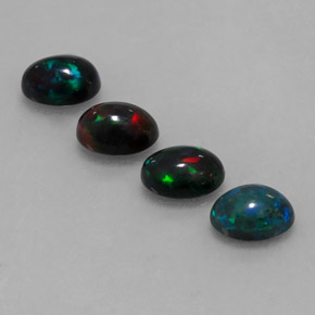 カラットの天然マルチカラーチョコレートオパール（7.1×5.2 mm・オーバルカット）