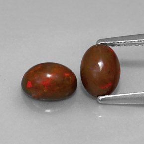 カラットの天然マルチカラーチョコレートオパール（7.1×5.1 mm・オーバルカット）