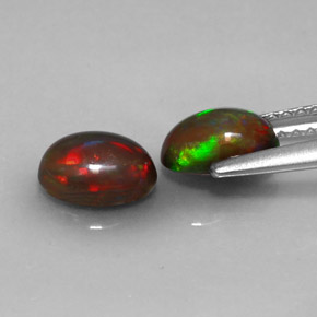 カラットの天然マルチカラーチョコレートオパール（6.9×5.1 mm・オーバルカット）
