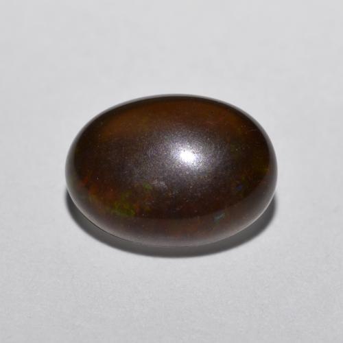 0.52カラットの天然マルチカラーチョコレートオパール（8×5.8 mm・オーバルカット）