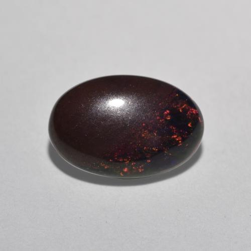 0.80カラットの天然マルチカラーチョコレートオパール（8.9×6 mm・オーバルカット）