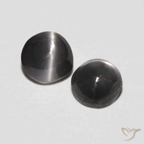 Shop natural 0.41ct 濃い灰色 リソベリルキャッツアイ gems, 楕円形, from スリランカ at GemSelect. In stock, global shipping!