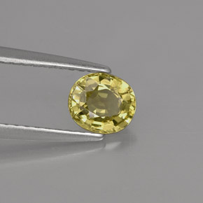 0.71カラットの天然緑がかったゴールドクリソベリル（5.7×4.9 mm・オーバルカット）