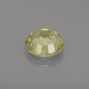 0.72カラットの天然緑がかったゴールドクリソベリル（5.44 mm・ラウンドカット）