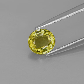 0.70カラットの天然ゴールデングリーンクリソベリル（5.5×5.1 mm・オーバルカット）