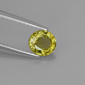 0.70カラットの天然ゴールデングリーンクリソベリル（5.5×5.1 mm・オーバルカット）