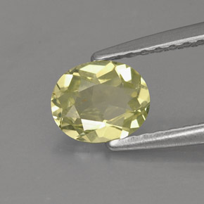 0.57カラットの天然緑がかった黄色クリソベリル（5.9×4.8 mm・オーバルカット）