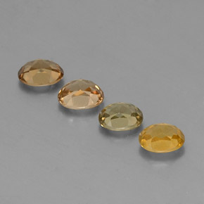 カラットの天然ゴールデングリーンクリソベリル（5.5×4.6 mm・オーバルカット）