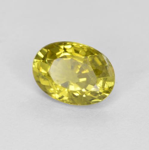 0.57カラットの天然ミディアム薄いイエロークリソベリル（5.9×4.2 mm・オーバルカット）