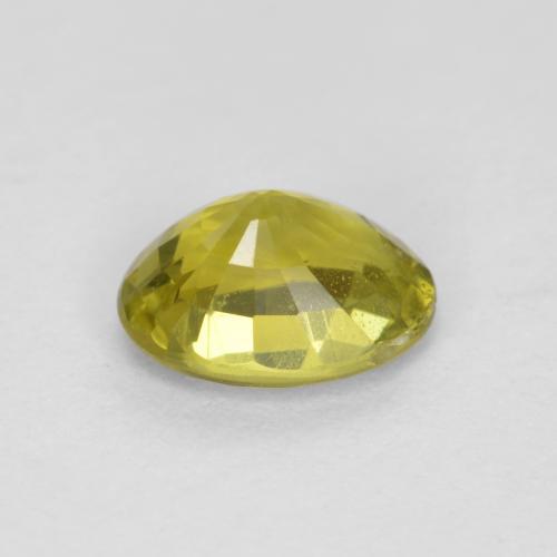 0.57カラットの天然ミディアム薄いイエロークリソベリル（5.9×4.2 mm・オーバルカット）