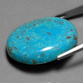 30.84カラットの天然マルチカラークリソコラ（28.2×23.7 mm・オーバルカット）