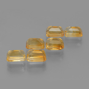 6.92カラットの天然Orange-Gold シトリン（7.1×5.1 mm・エメラルドカット）