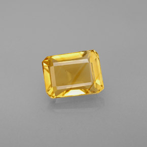 1.71カラットの天然ゴールデンイエローシトリン（8×6 mm・エメラルドカット）